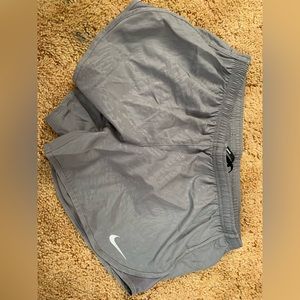 Grey Nike Dri-fit shorts.